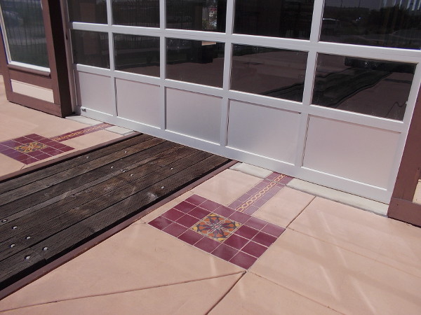 Mysterious stretch of train track emerges from the barn's door. A very cool bit of history can be rolled outdoors during special occasions..
