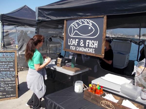 I saw a new canopy and sign at the ever-expanding Tuna Harbor Dockside Market. It's a food place called Loaf and Fish. They've got one of my favorite things!