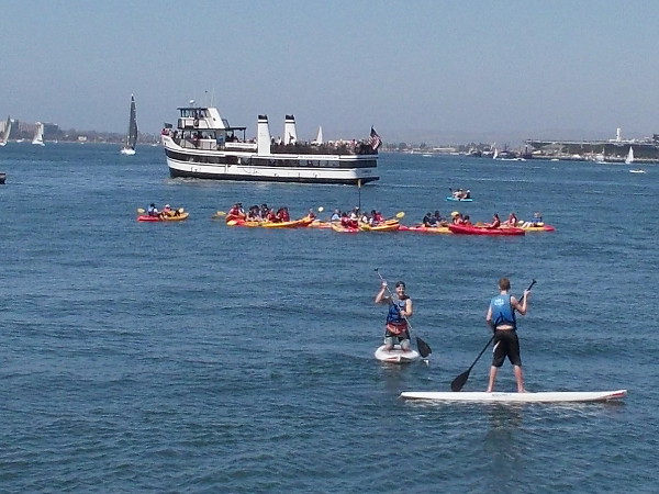 Look at all the weekend activity! Standup paddleboarders, a big group of kayakers, and the Coronado ferry!