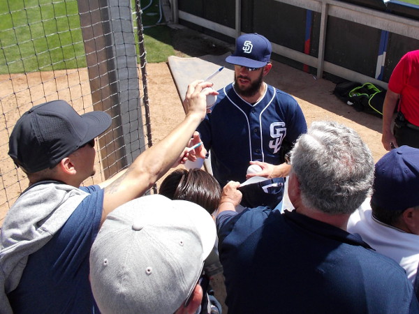Superstar pitcher James Shields signs autographs for lots of excited fans during 2016 FanFest at Petco Park.