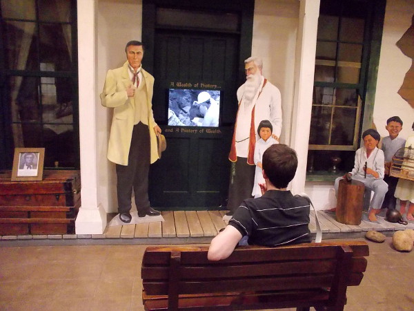 Visitor to the small museum watches a video which includes information about archaeological discoveries, the history of the casa and the lives of those who were sheltered here.