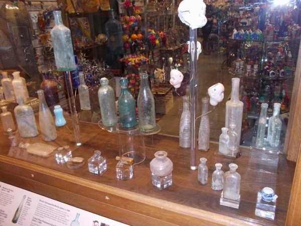 People interested in collecting antique bottles would be mesmerized by the large assortment on display.
