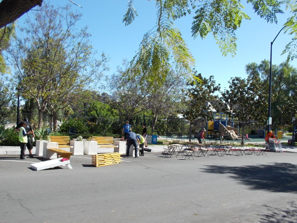 I saw folks setting up the Jacaranda Spring Thing on Date Street this morning, as I set out on my walk.