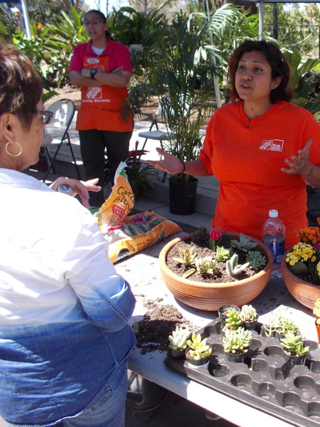A neighbor learns about outdoor and indoor gardening.