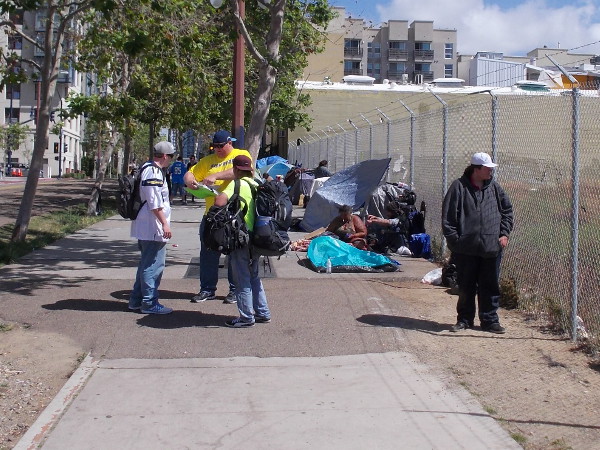 Petitions were being signed on the sidewalk along Park Boulevard, where many homeless people camp in San Diego.