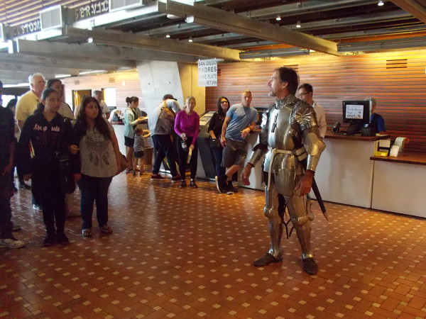 Reciting Shakespeare's rousing speech by King Henry V, urging his English army to bravely fight the French at the Battle of Agincourt in 1415.