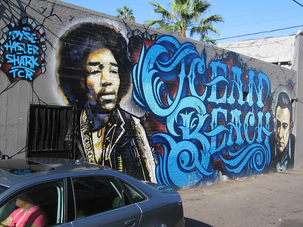 Super cool street mural in Ocean Beach depicts music legends Jimi Hendrix and Johnny Cash.