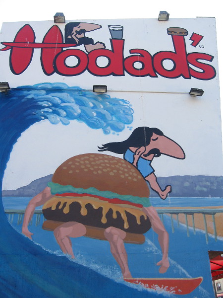 Long hair and a long nose...and a surfing hamburger. The famous Hodad's in Ocean Beach is a popular destination for many hungry people in San Diego.
