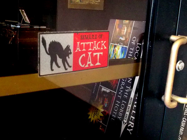 Don't break into this downtown San Diego business. A sign on the door warns: Beware of Attack Cat!