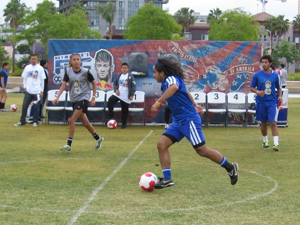 Youth play soccer in San Diego's Waterfront Park. They are competing today in the Neymar Fives Soccer Tournament. World champs get to meet the Brazilian superstar.