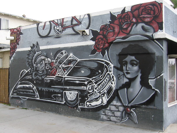 Cool mural in San Diego's hip South Park community features Latino and Native American cultural influences.