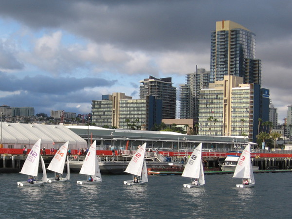 ICSA Women's Semifinals on San Diego Bay. Competing sailboats approach downtown's Cruise Ship Terminal.