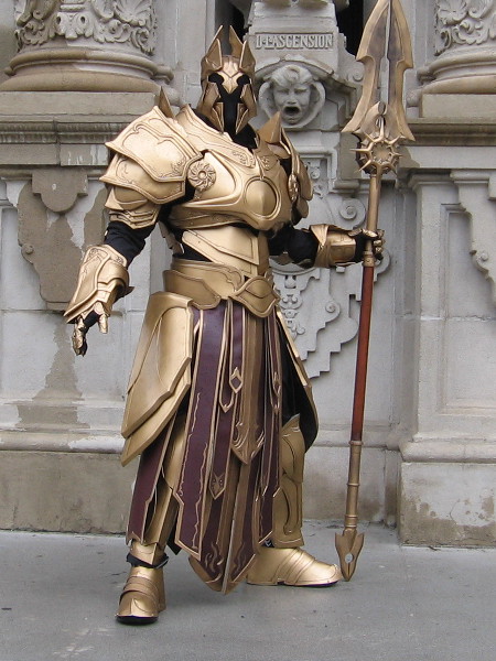 Truly amazing cosplay! A warrior in incredible golden armor seems to have emerged from Lord of the Rings, Arthurian legend, Game of Thrones...or the mists of the distant past. (San Diego Comic-Con is coming in two months! I can't wait! I'll be capturing loads of cool pics!))