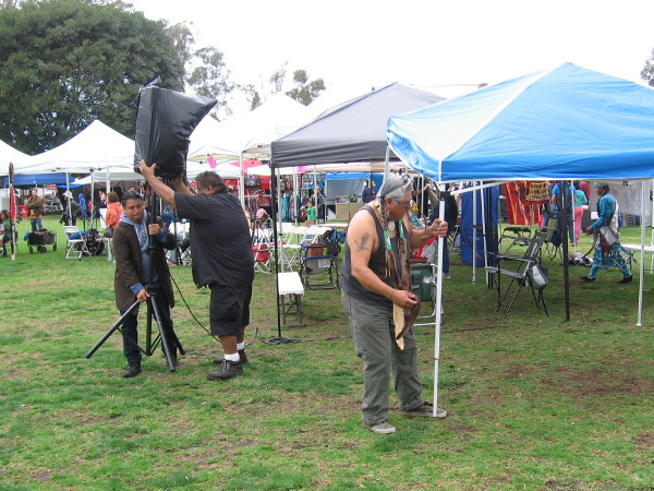 I swung by the pow wow during its first hour. Many additional participants were arriving and setting up.