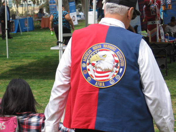 Someone proudly wears an American Indian Warriors Association emblem.