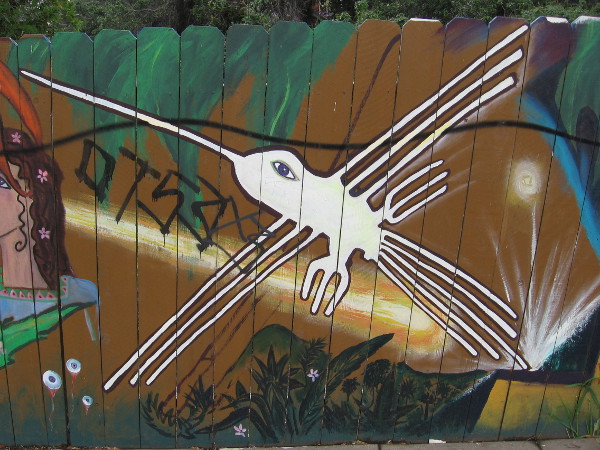 A hummingbird drawn like ancient Southwest rock art.