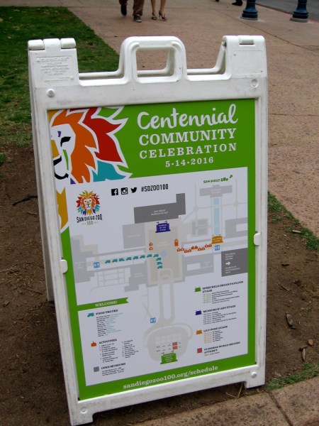 Sign lists the various activities at the San Diego Zoo Centennial community celebration.