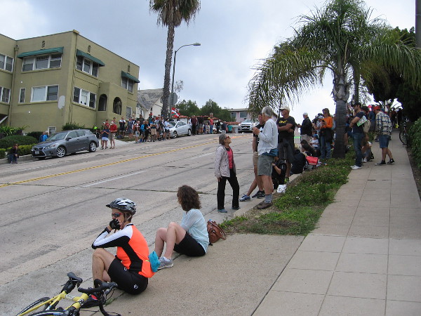 About half an hour before the racers were anticipated, lots of biking enthusiasts and onlookers were already lining the sidewalks.