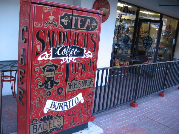 Utility box on Sixth Avenue painted with tea, sandwiches, coffee, salads, burrito and bagels. It made me so hungry, I wanted to step through that cafe's door!