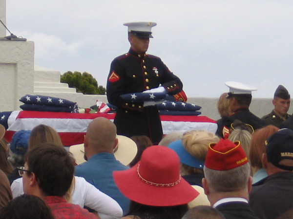 Folded flags are presented to families of fallen heroes. Everyone watching was very attentive and quiet.