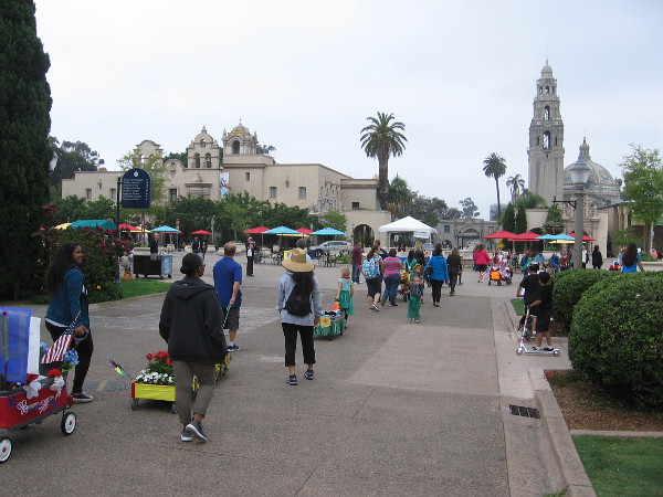 The colorful Floral Wagon Parade enters the Plaza de Panama, where speeches will kick off the day's big 2016 Garden Party.