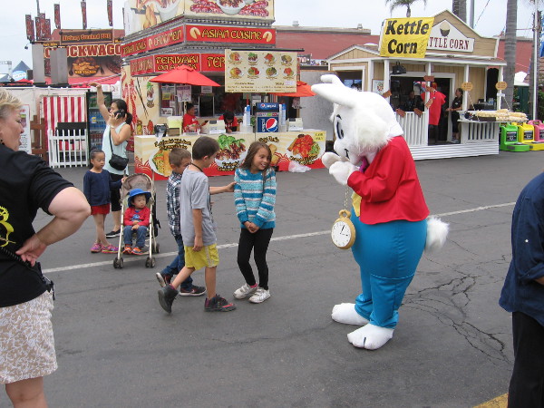 There's a White Rabbit walking along! Don't follow him! You don't know where he might lead!