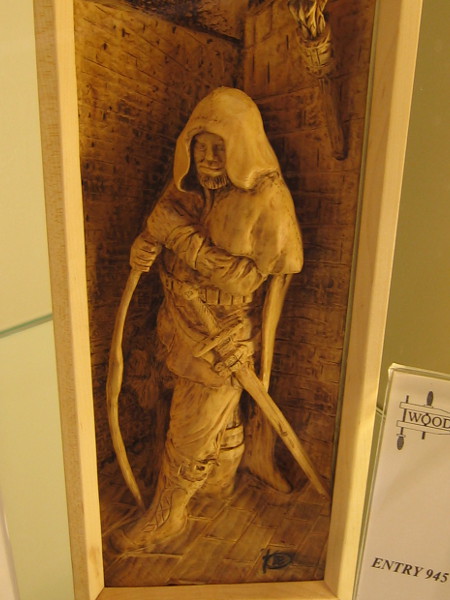 Perhaps this is a wood version of Strider from Lord of the Rings. Ranger, Basswood, Randy Stoner.