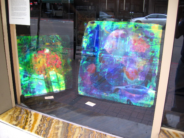More examples of Liguori's dazzling, thought-provoking pieces. Apparently the application of his special holographic paint on glass is an entirely new, revolutionary art form.