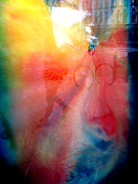 A dim somebody strides through a splash of vibrant color.