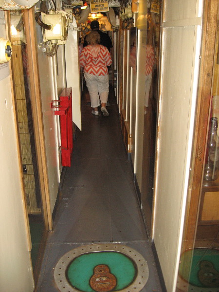 Heading through the Foxtrot-class Soviet submarine. Tiny rooms on either side include the Captain's Cabin, the Officer's Wardroom, and Medical Exam Room.