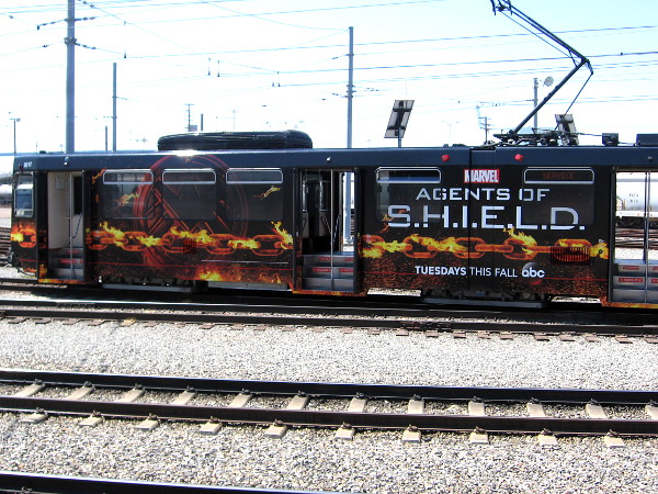 Another older model San Diego trolley car has been wrapped with the new Agents of S.H.I.E.L.D. graphics, for the upcoming 2016 Comic-Con. I've seen several of these cars in the past few days!