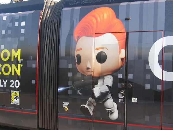 Looks to me as if Conan is a Star Wars Stormtrooper here. He must've lost his helmet.