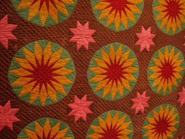 Close-up photograph of fantastic Sunburst quilt.