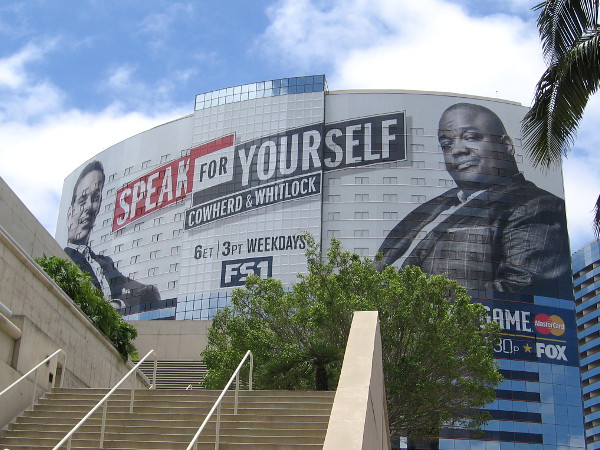 A huge MLB All-Star Game building wrap has appeared on the Marriott Marquis hotel in downtown San Diego! Promoted is the sports talk show on FS1 called Speak For Yourself, with Colin Cowherd and Jason Whitlock.