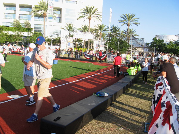 The opening ceremony and introductions are over. Time for the teams to take the field and experience a short but fun baseball clinic!