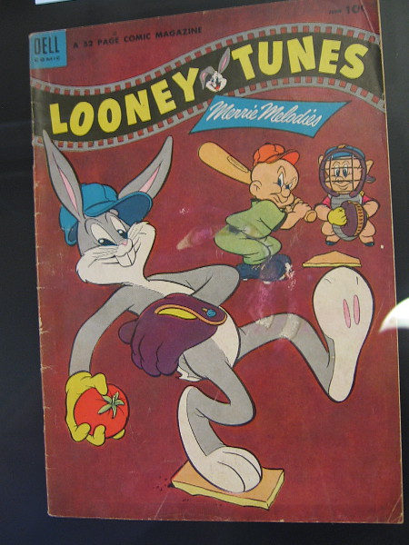 One of several Looney Tunes Merrie Melodies baseball comic books on display. Bugs Bunny is about to pitch a tomato to arch-nemesis Elmer Fudd!
