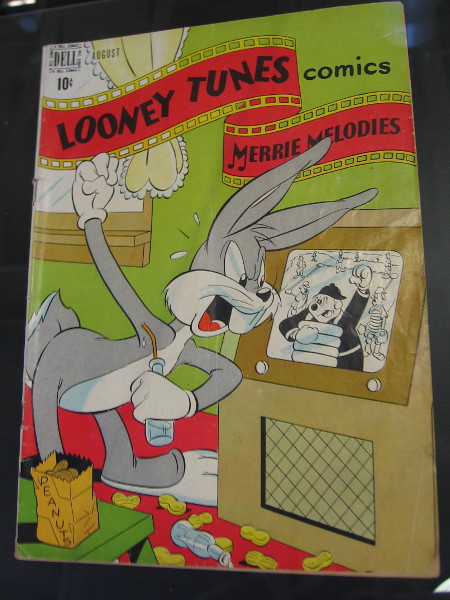 Comic book cover features Bugs Bunny angrily calling a baseball umpire out!