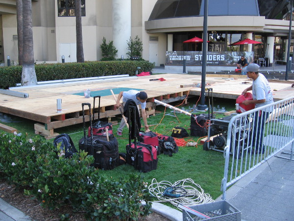 Workers get the Thunderbirds Are Go stage ready across Harbor Drive from the San Diego Convention Center.