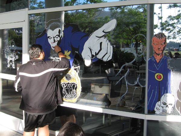 Artist puts finishing touches on a sinister Joker. 2016 San Diego Comic-Con is almost here!