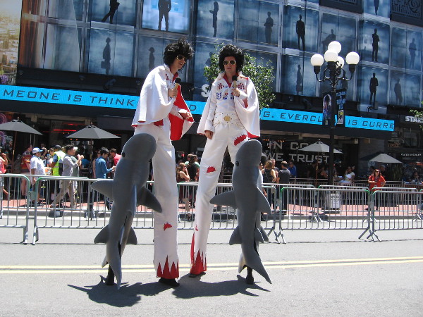 Last year it was Uncle Sams on stilts. In 2016, it's a bunch of Elvises. Or is that Elvi? Those sharks seem unstoppable.
