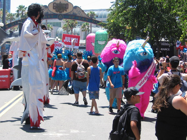 Some of that weirdly awesome cosplay approaches, coming up Fifth Avenue.