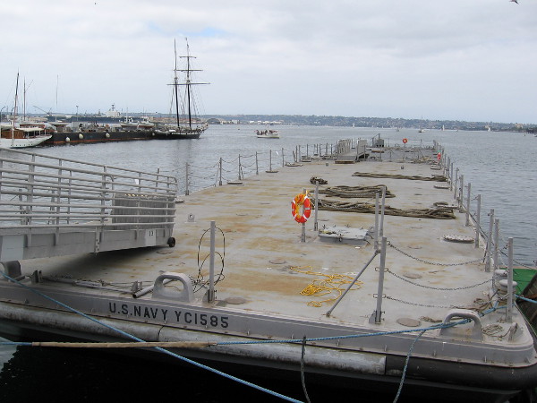 One of several U.S. Navy floating docks has been set in position near the Maritime Museum of San Diego, in preparation for the 2016 Festival of Sail.