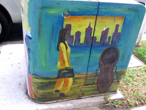 Street art in North Park shows a woman walking through the city.