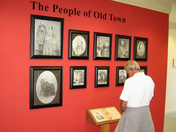 Visitor to the second floor of the McCoy House Museum learns about some notable early residents of Old Town San Diego.