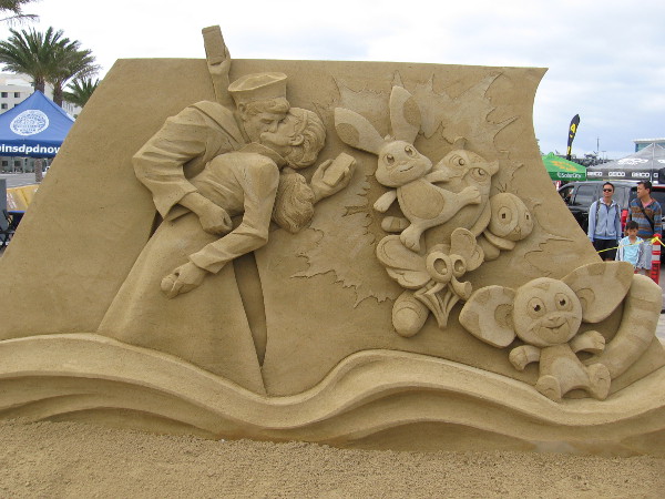 A sand sculpture representation of the famous statue Ultimate Surrender, and magical animals greet people arriving in the morning for a special festival.