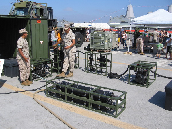 A water filtration system that uses reverse osmosis in the field, often far from reliable water sources, on display for curious STEM fair visitors.