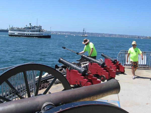 Out at the end of the Maritime Museum of San Diego's dock, three cannons are prepared to be fired!