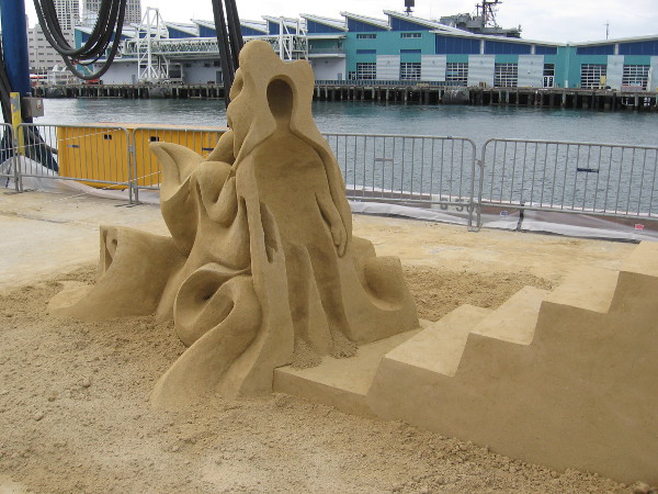 This abstract work of sand art makes the viewer think about its potential meaning.