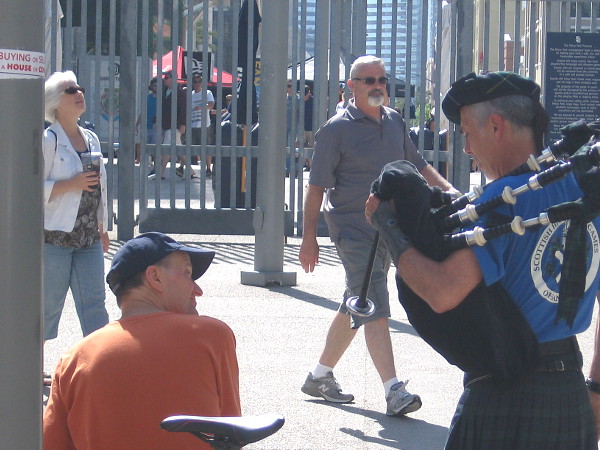 Bagpipes and a smile outside Petco Park.