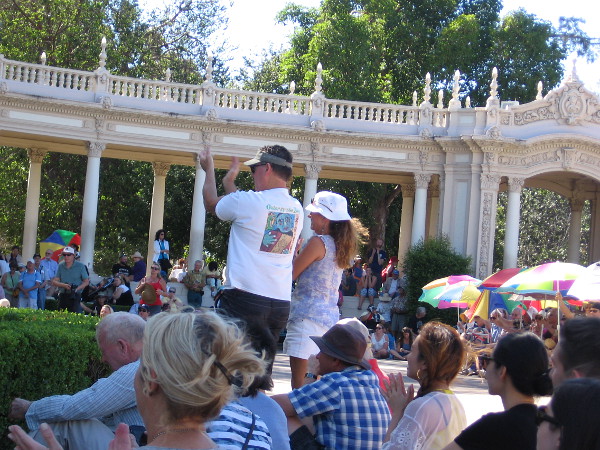 The beginning of a standing ovation, just as Carol asks everyone to stand for the National Anthem.
